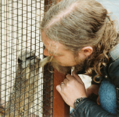 Bill making friends with Tia the meerkat